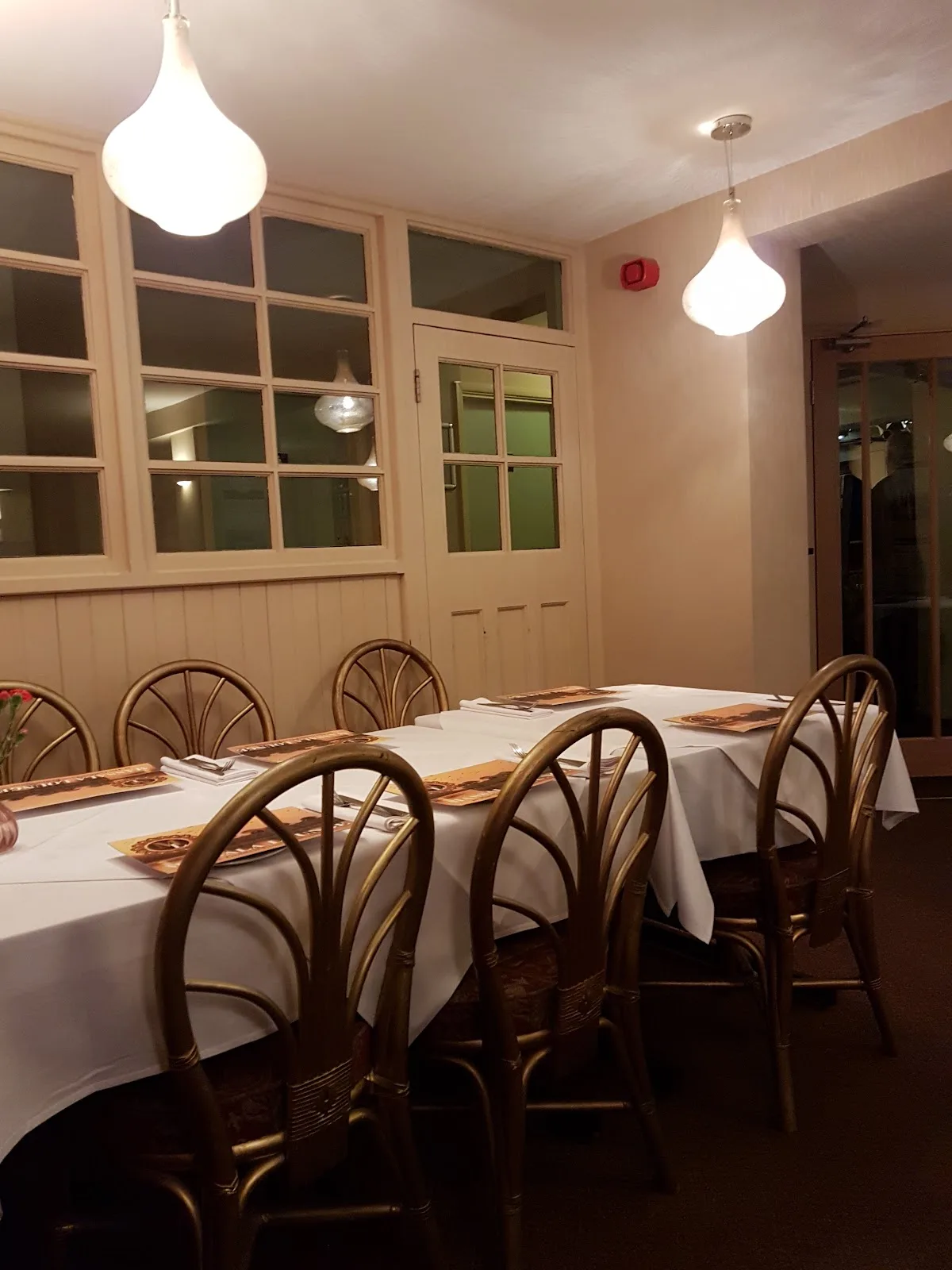 Tables laid for dinner in the Masala Lounge restaurant at the Golden Lion